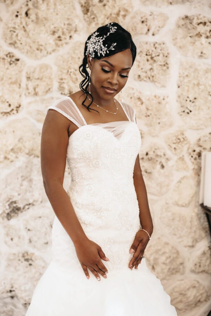 Bride posing at Secret Gardens Miami wedding.