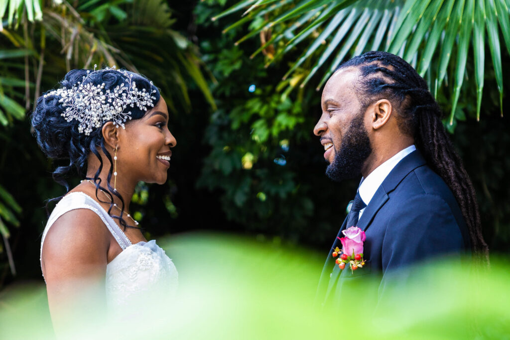 Bride and groom's first look at Secret Gardens Miami wedding.